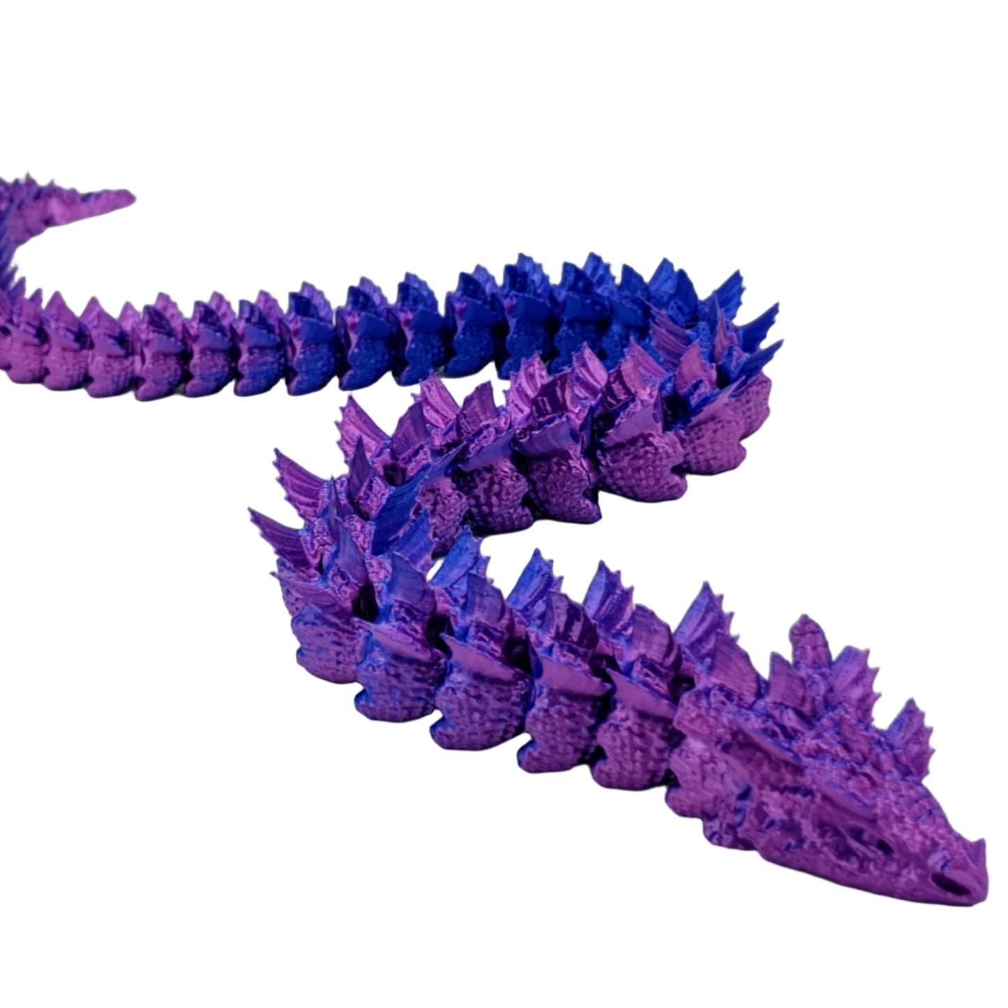 Purple and blue dragon-like creature model on a white background